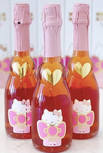 Load the image into the Gallery viewer, Hello Kitty Sweet Pink Spumante Rosè teddy bear holding a heart with "I love you"